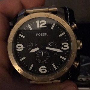 Gold Fossil gage watch.